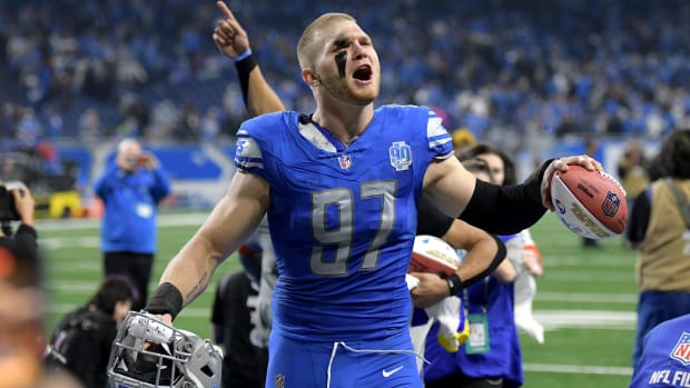 Detroit Lions defensive end Aidan Hutchinson (97) celebrates after a 2024 NFC wild card game against the Los Angeles Rams at Ford Field.